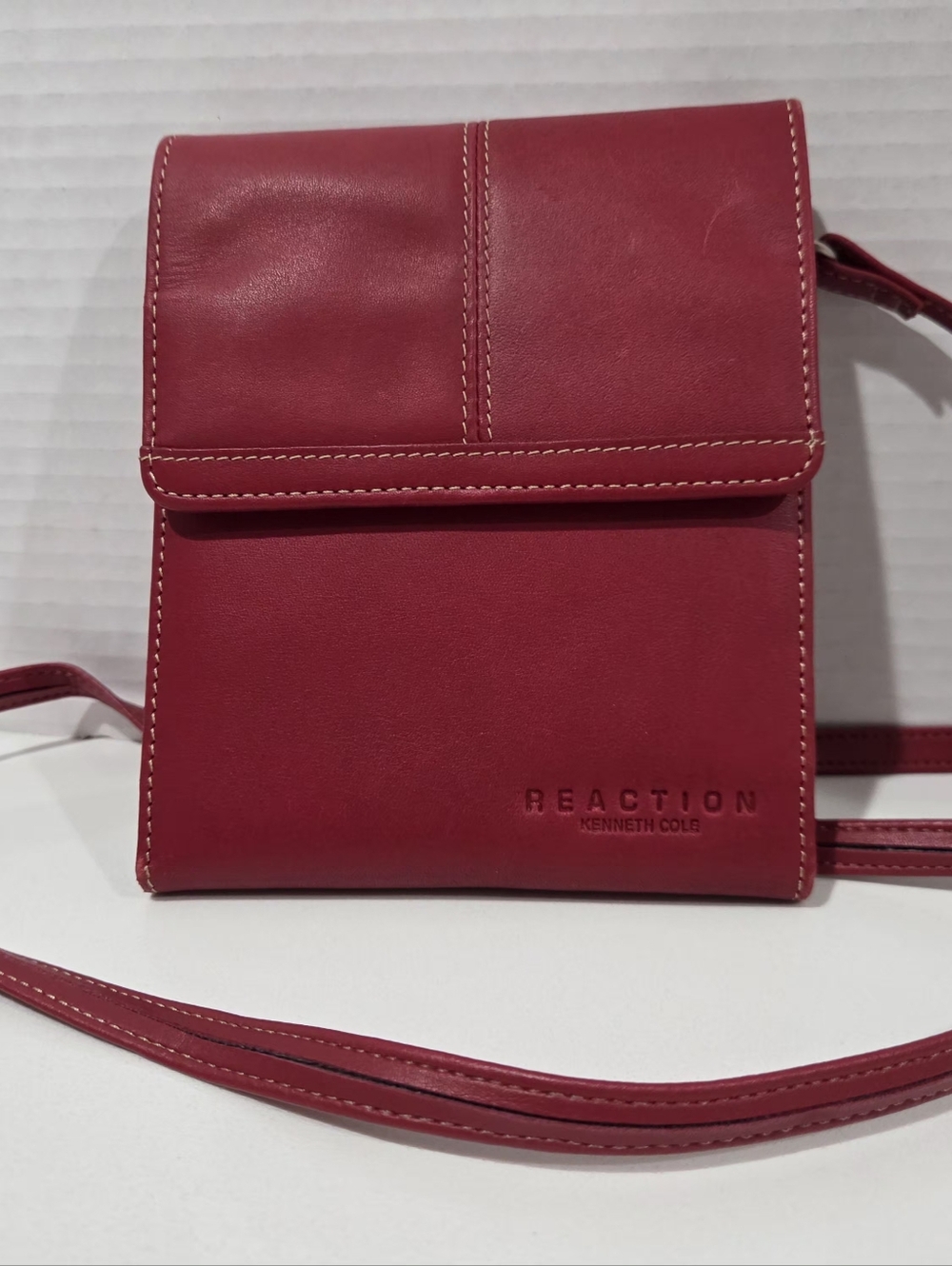 Kenneth Cole Reaction cranberry red crossbody bag